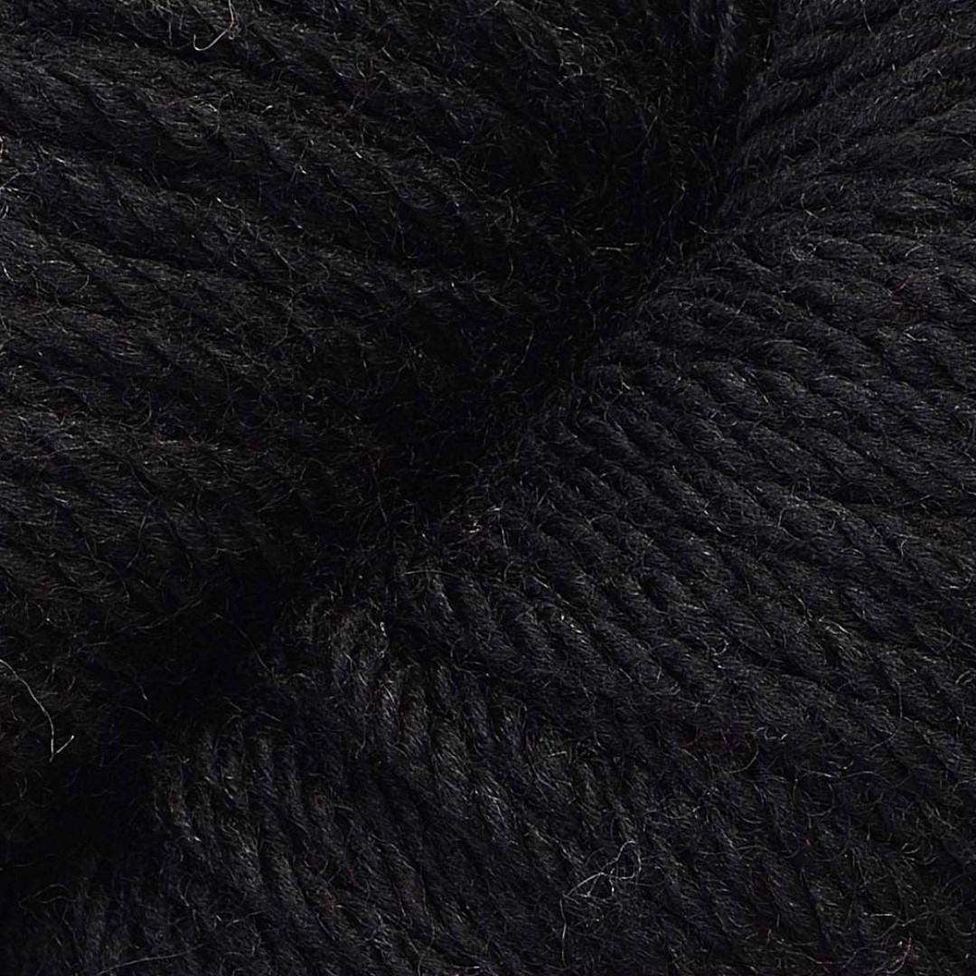 Close-up picture of black Cascade 220 Superwash Aran yarn.