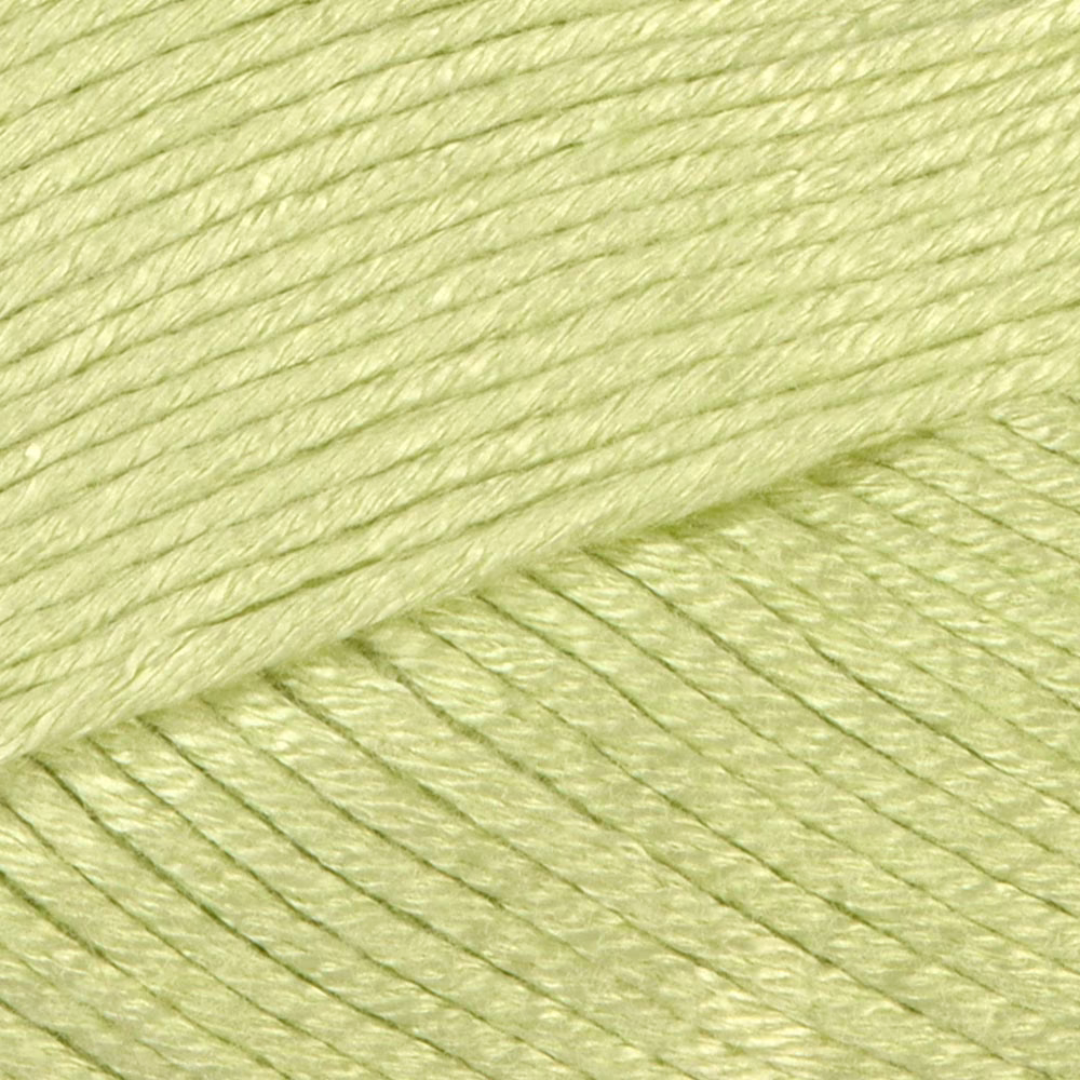 Close-up picture of Lion Brand Truboo yarn in shade Celery. It is a soft yellow-green color.