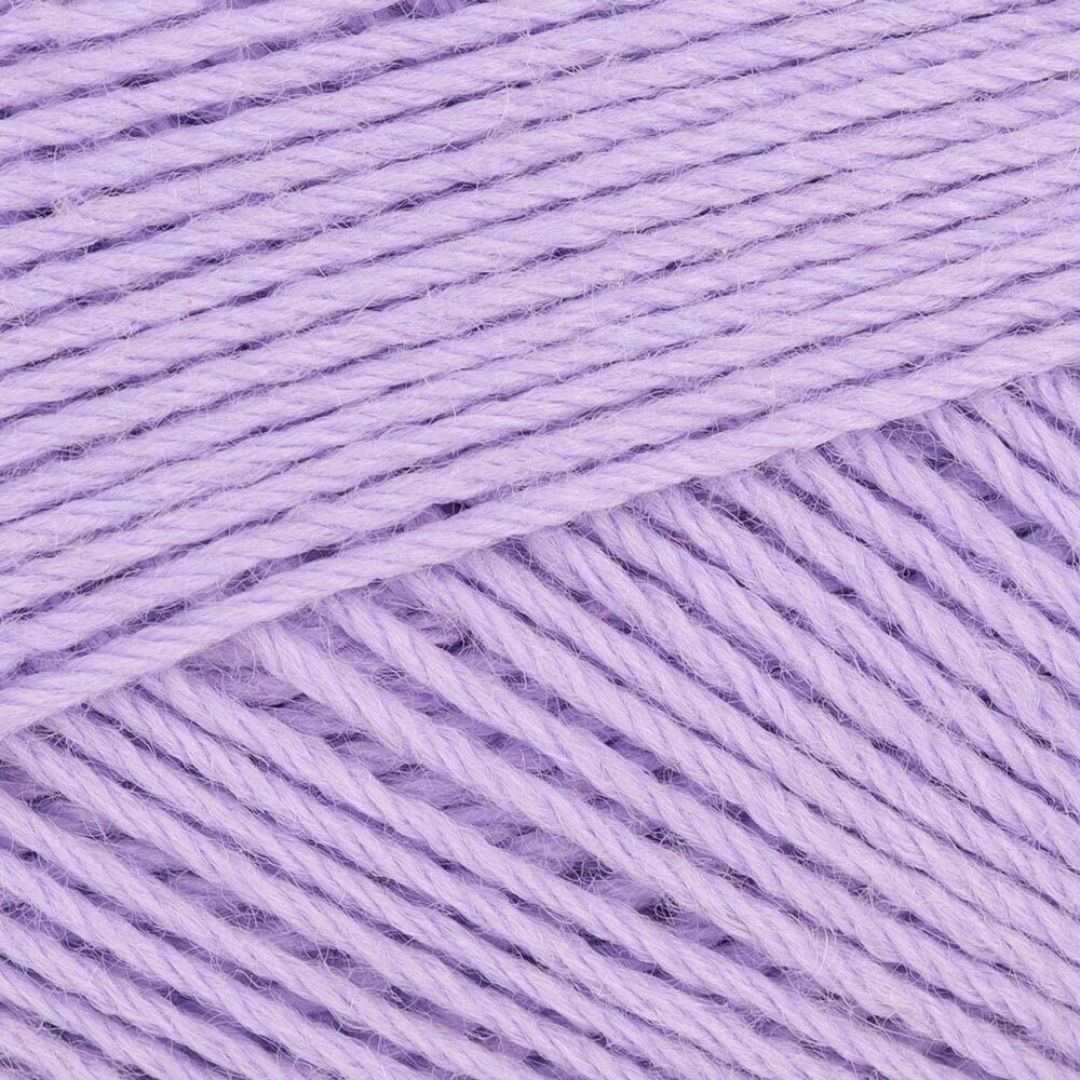 A close-up of a lavender skein of Berroco Vintage Sock yarn.