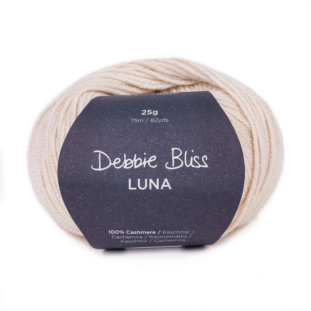 A beige skein of Debbie Bliss Luna yarn.