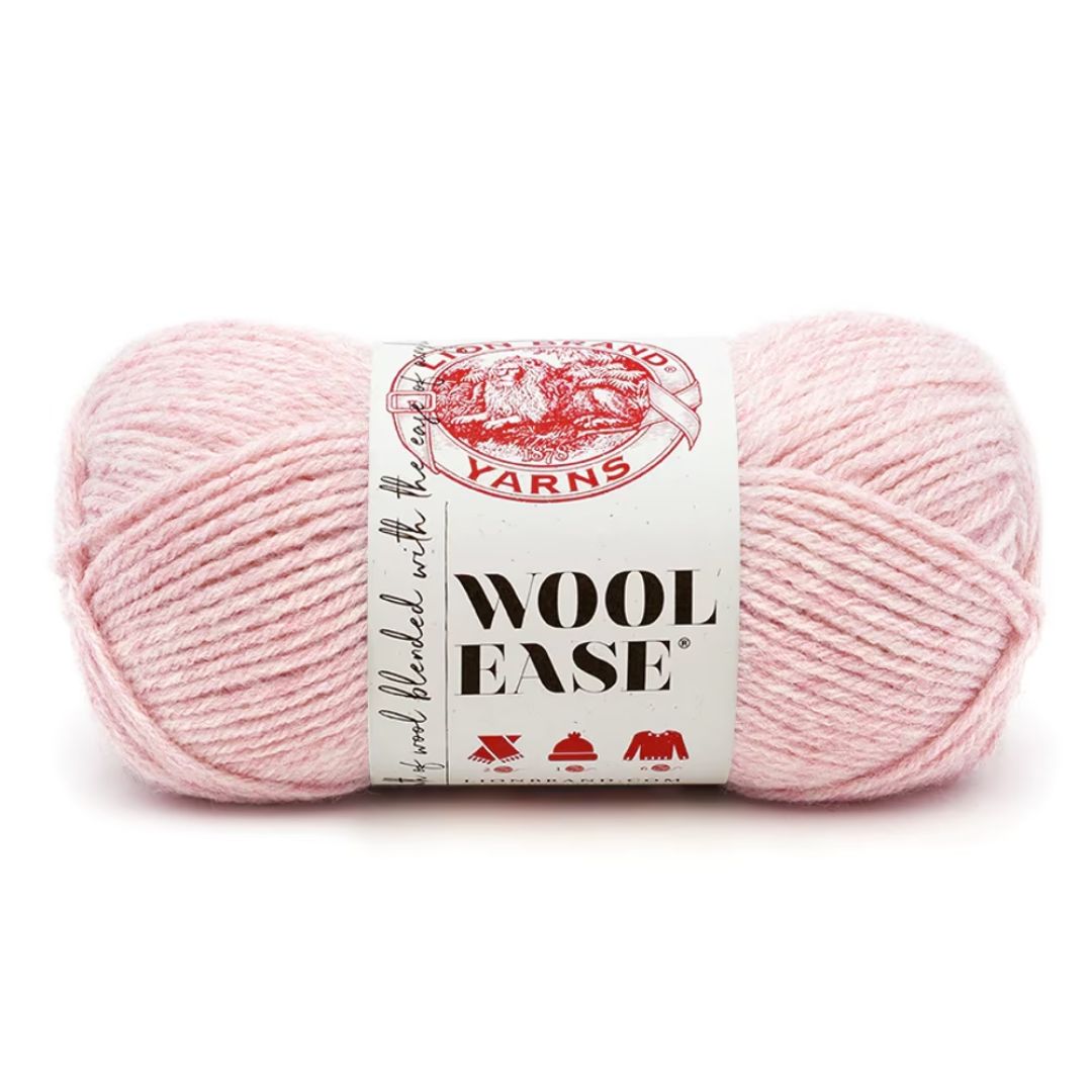 A soft pink skein of yarn.