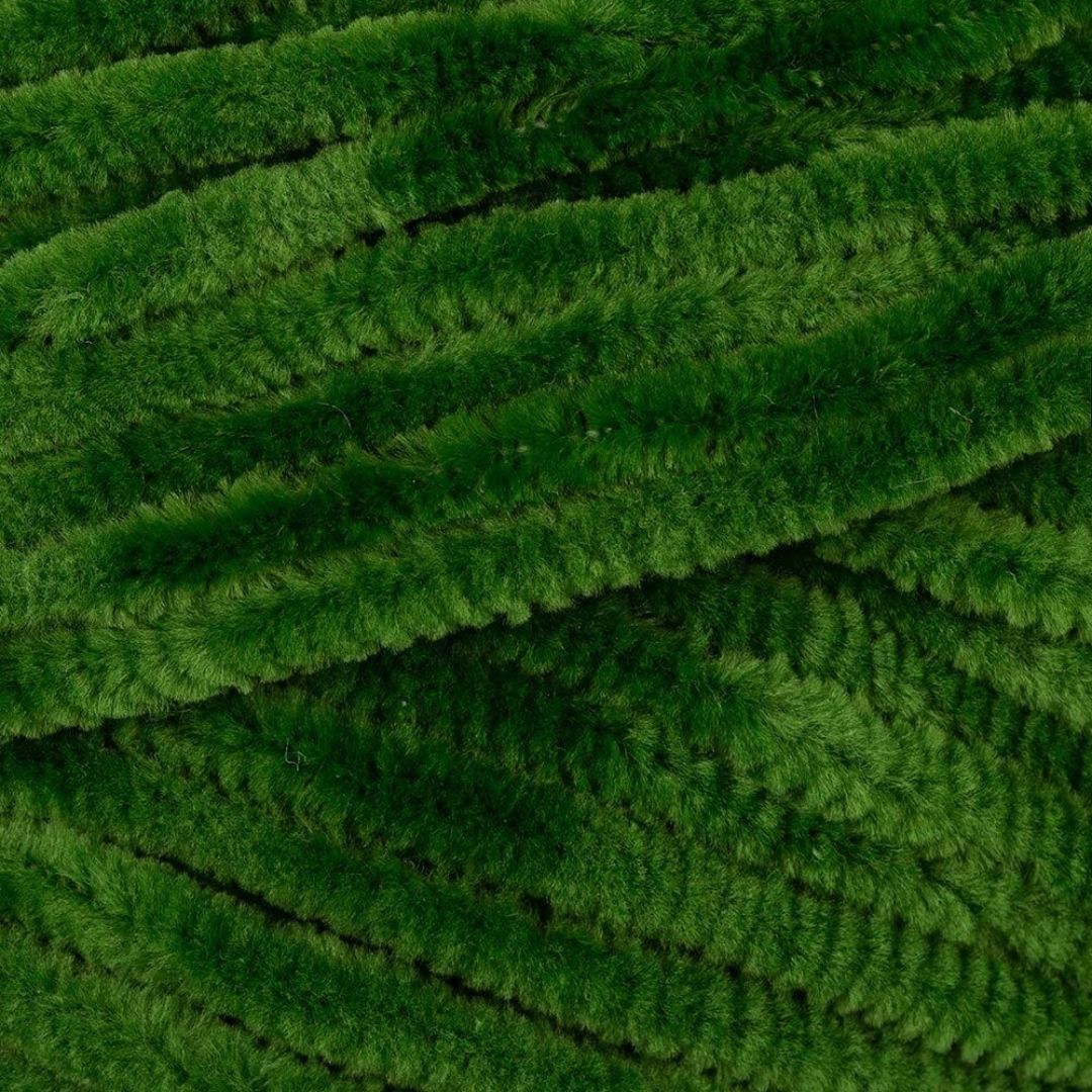A close-up of fuzzy deep green yarn.