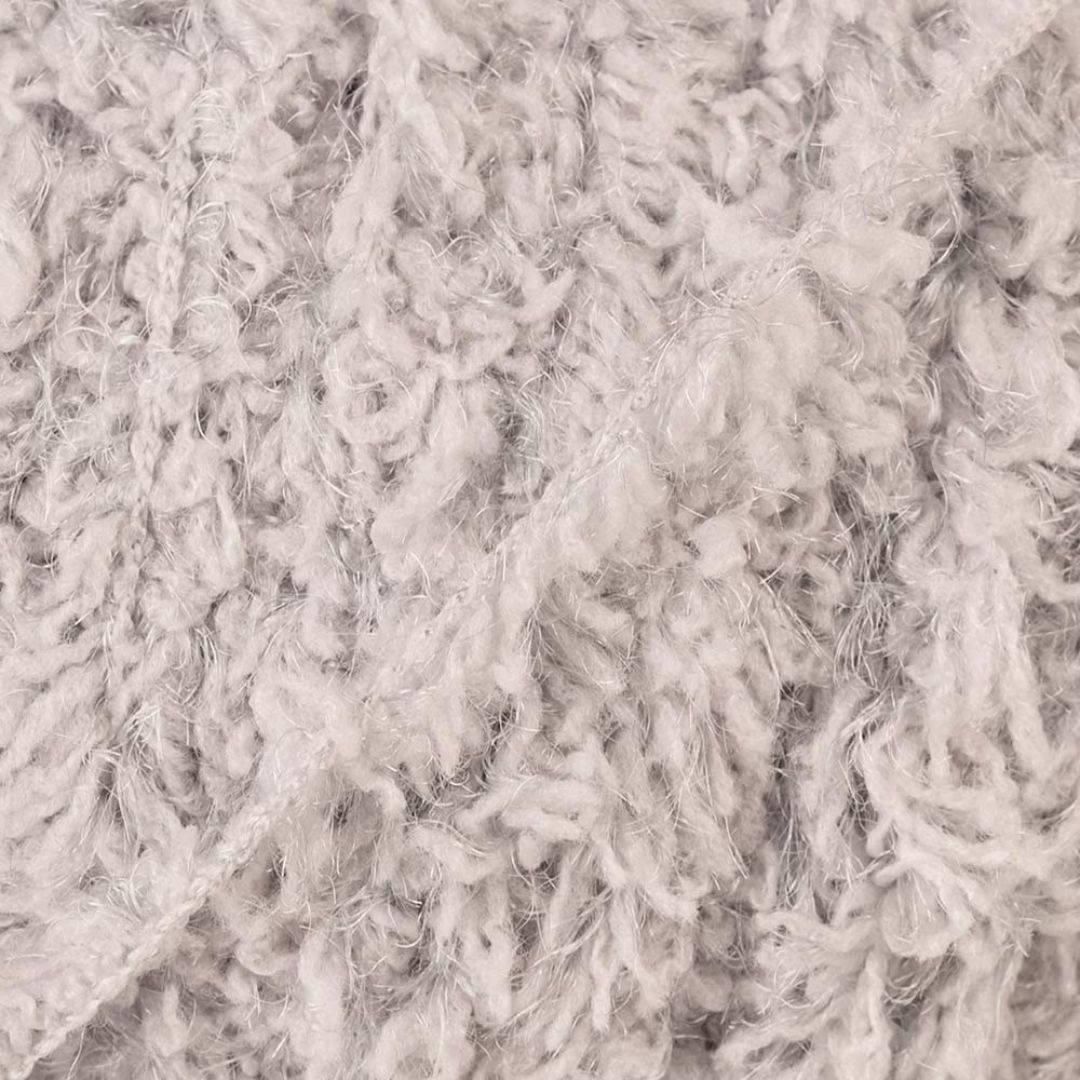 Close-up of light grey fluffy yarn.
