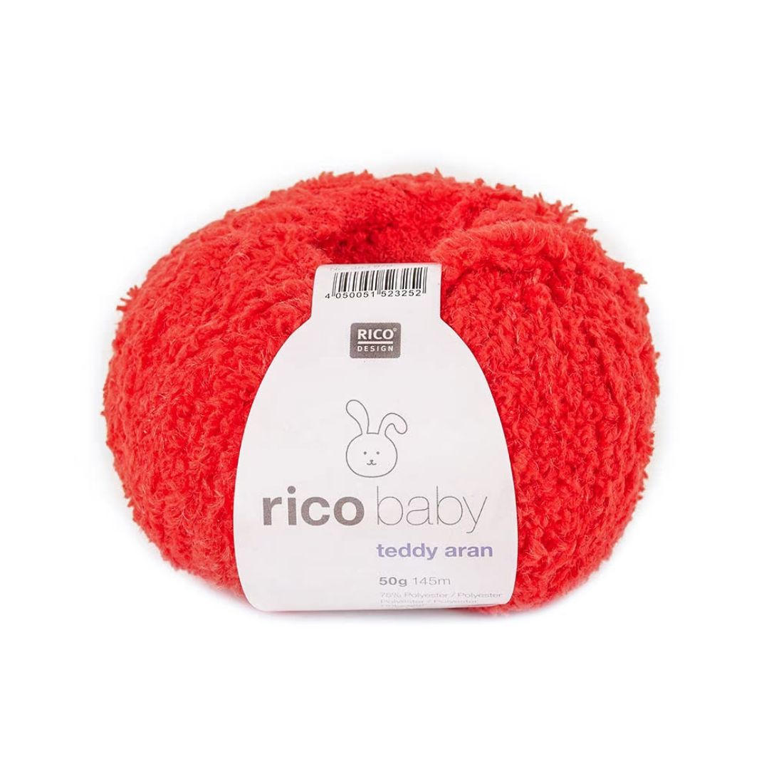 A cake of red fluffy yarn.