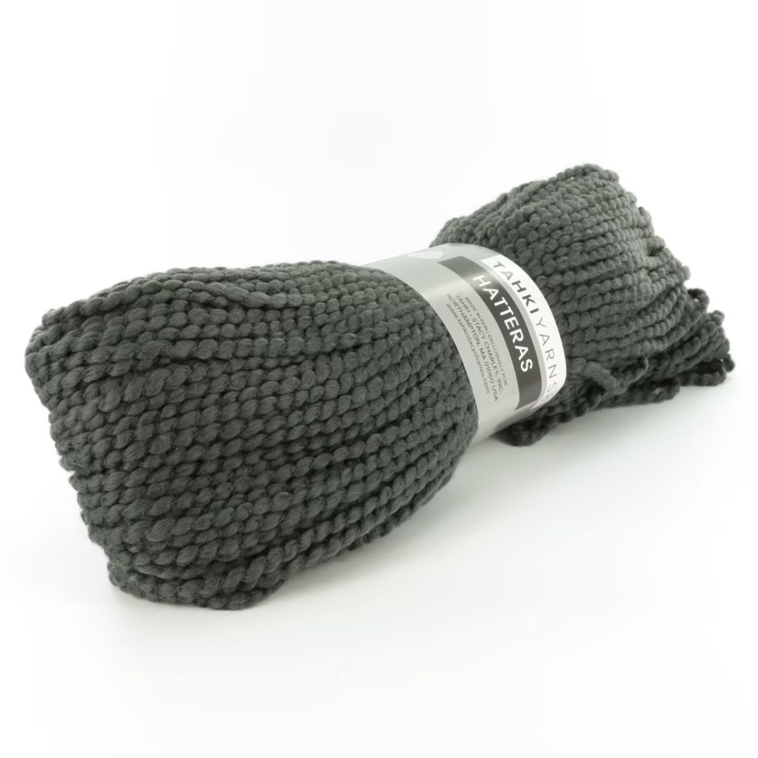 A hank of dark gray yarn.