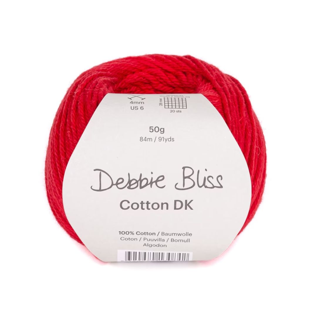 A ball of red Debbie Bliss Cotton DK yarn.