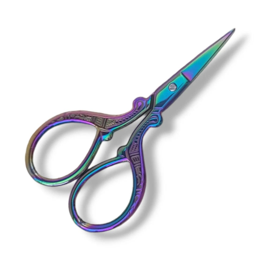 Small yarn scissors with a rainbow finish.