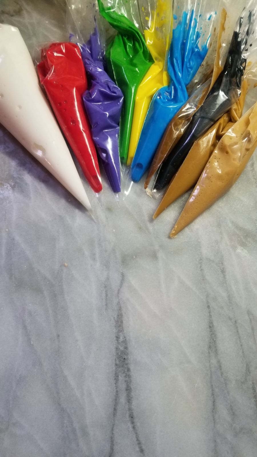 Colorful icing bags ready for decorating