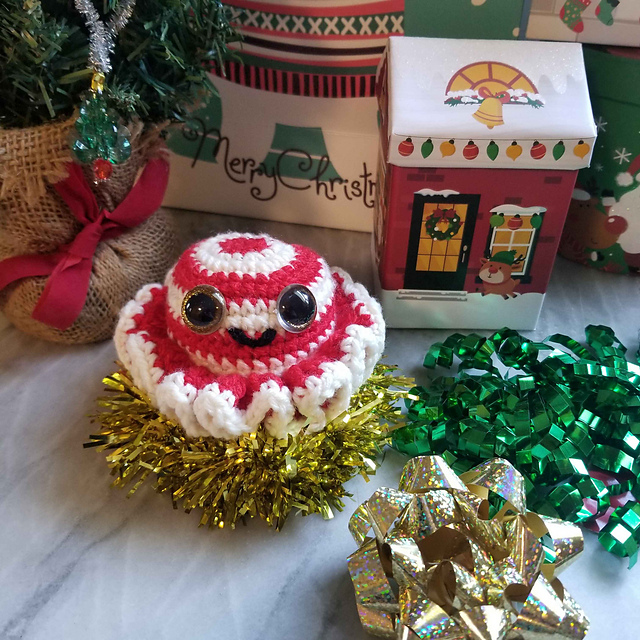 Crocheted Ophelia the Octopus ornament.